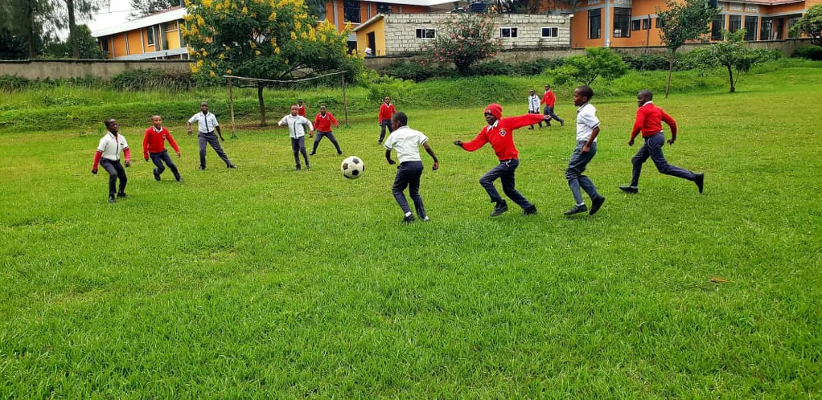 Students playing football.