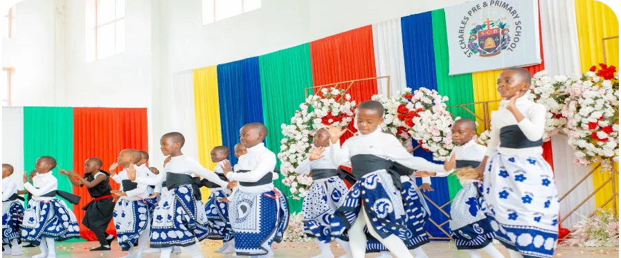 Pupils presenting a cultural performance at a school celebration.