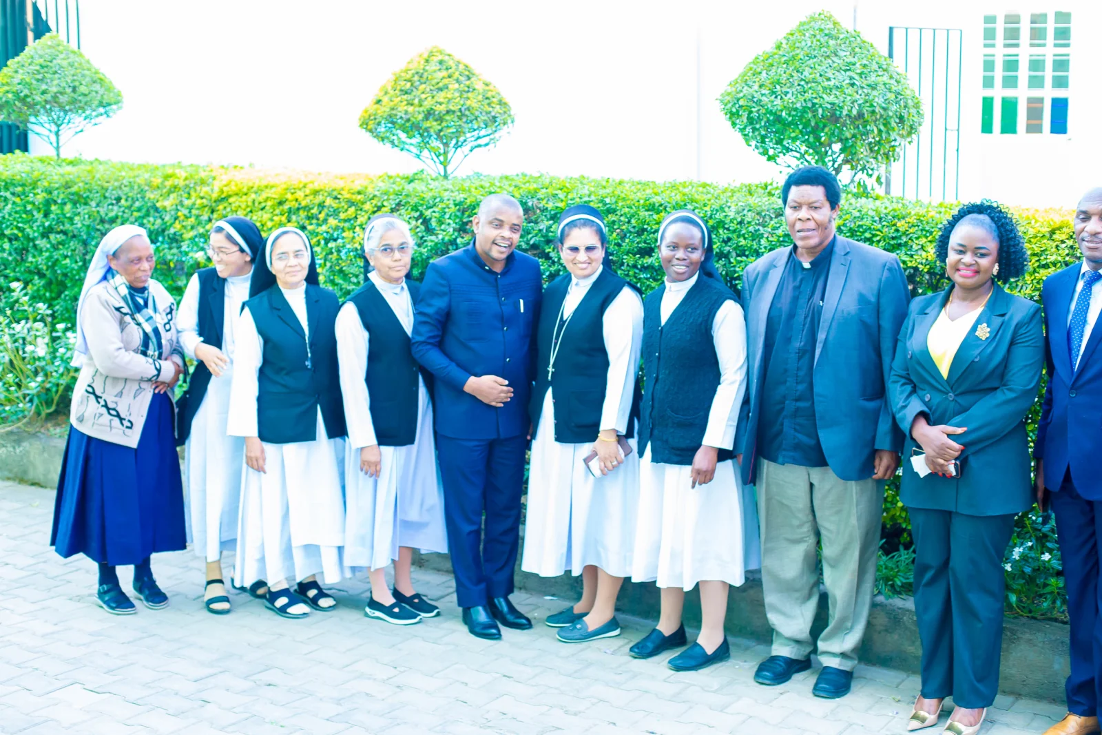 School sisters with guests and community members.