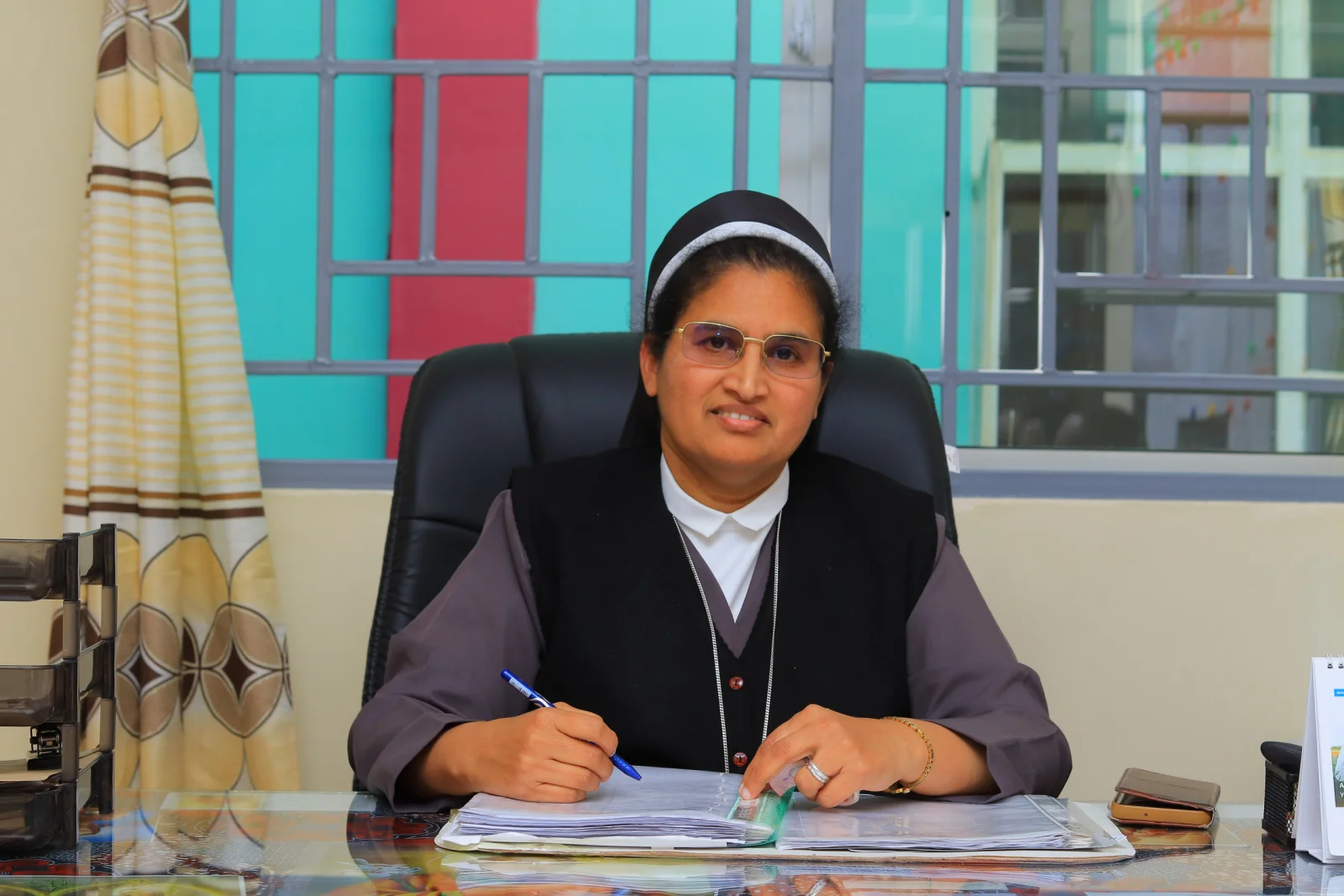 Head of School at work in the school office.